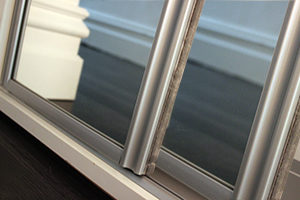Sliding mirror doors with dust strip